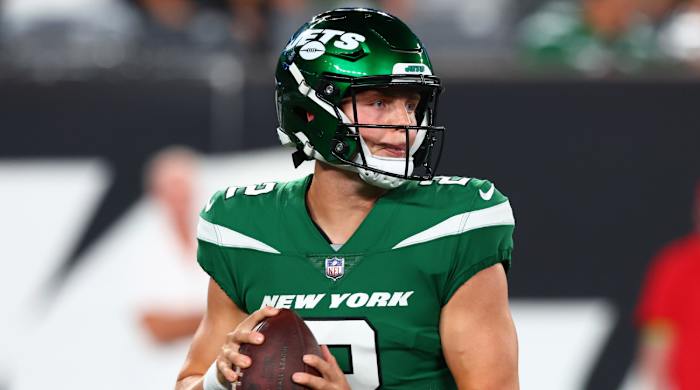 Jets quarterback Zach Wilson is trying to lead New York to the playoffs in place of Aaron Rodgers.